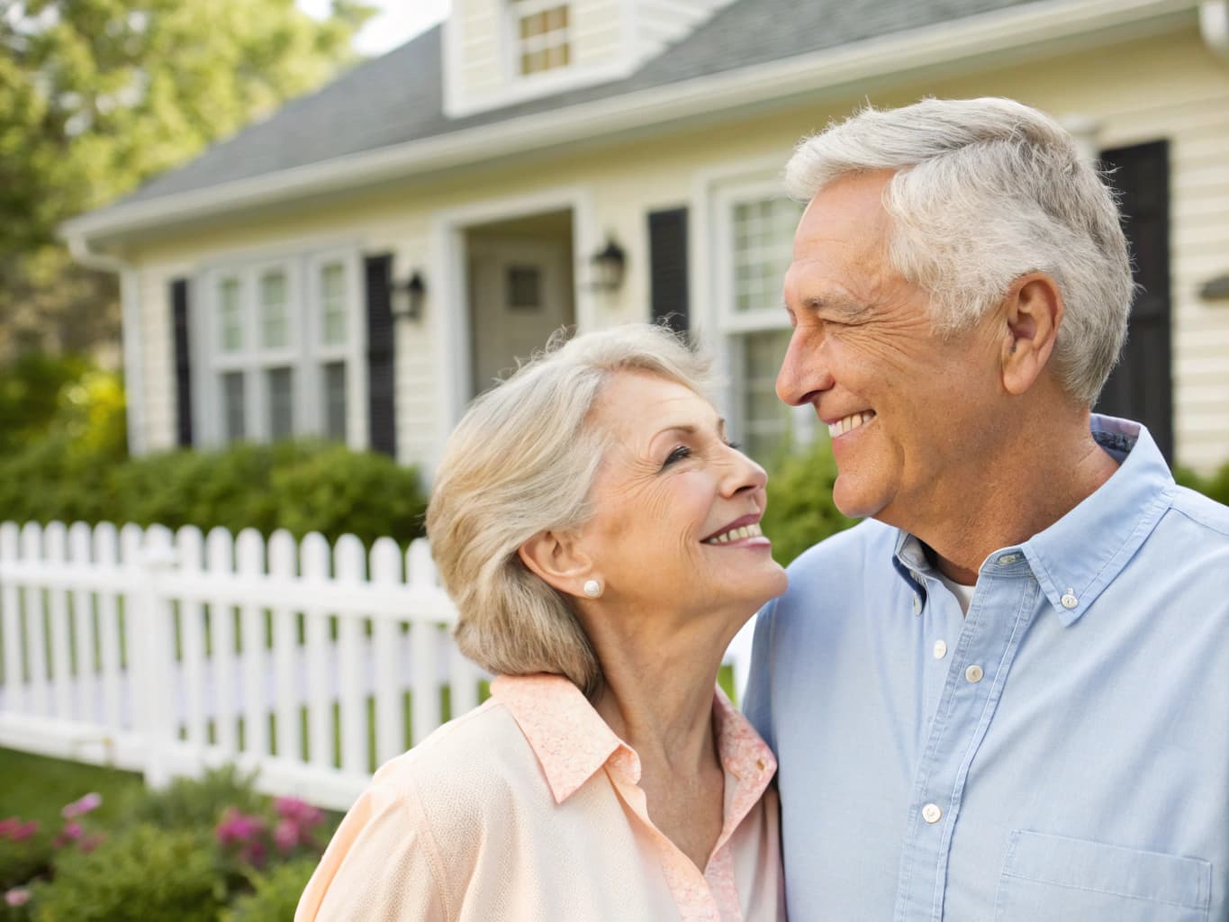 Happy senior couple reviewing their benefits